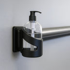 Universal Sanitiser Bracket – Secure Mount for Pump Dispensers (Up to 75mm Diameter)